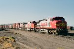 Santa Fe C44-9W's 656 & 661 bracket BNSF SD75M as they lead an eastbound past the depot 